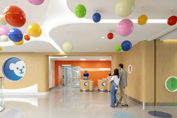A children's hospital room with bright, colorful objects filling the room.