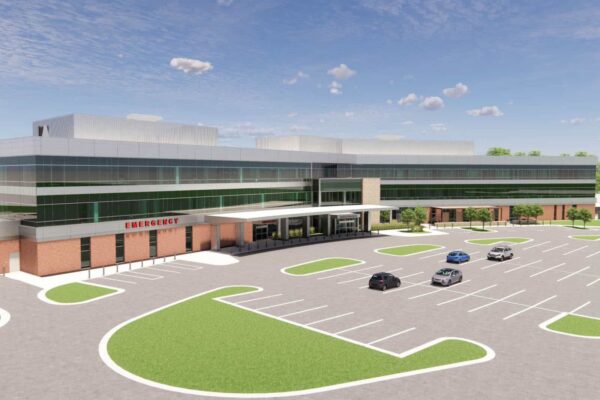 The tower is part of a broader $100 million expansion and renovation program that includes a three-story, 117,000-square-foot addition and roughly 25,000 square feet of remodel work.