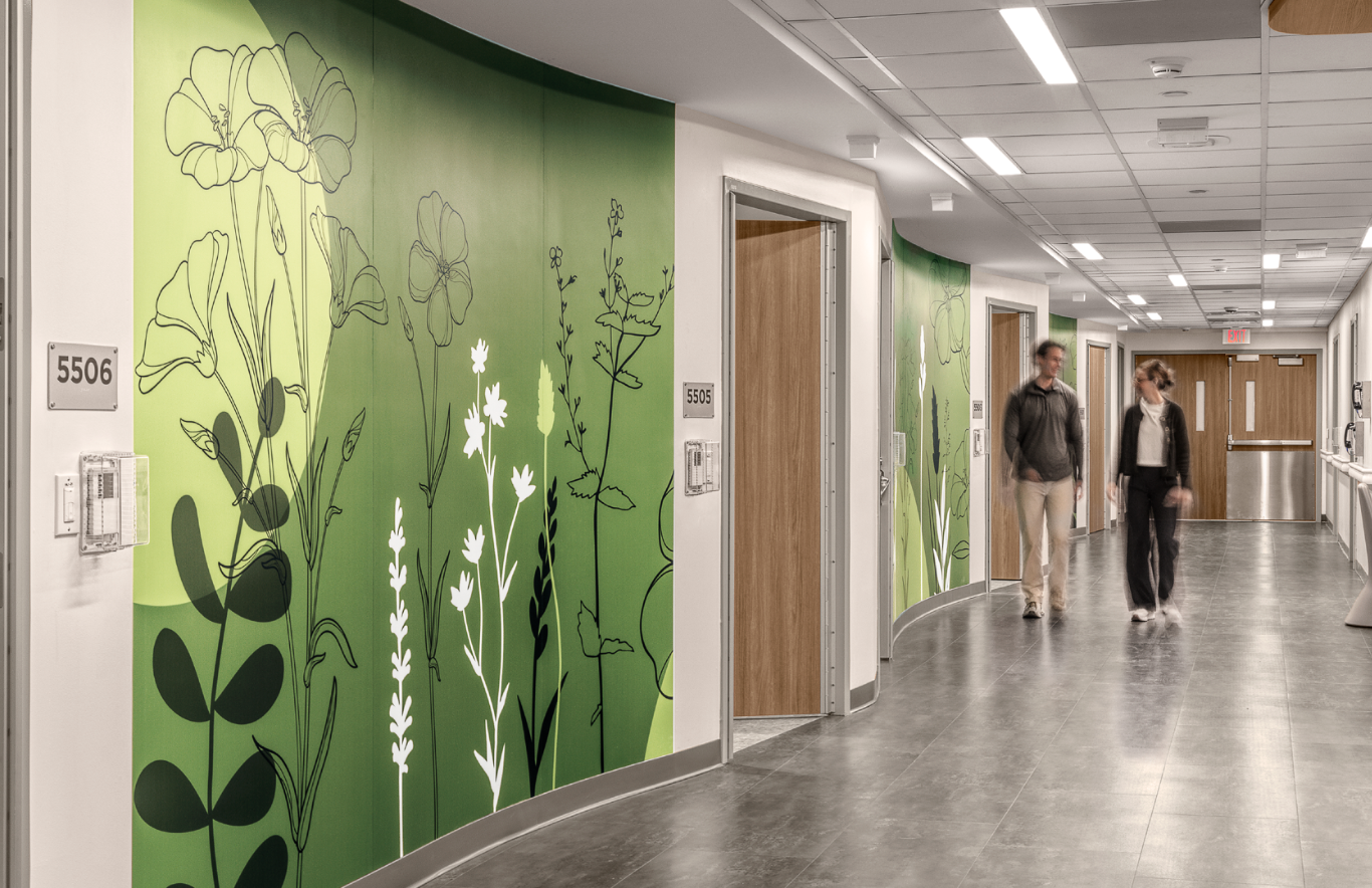 The inpatient unit is made up of four self-sufficient pods of 10-11 patient rooms each, supported by a shared core that has functions for staff breaks, nourishment, and workspaces.