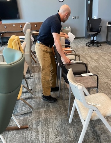 IU Health Fort Wayne staff evaluate potential furniture solutions for their new facility. Four Point Design provided interior design, furniture selection and specifications, and artwork coordination for the project. Image courtesy of Four Point Design.